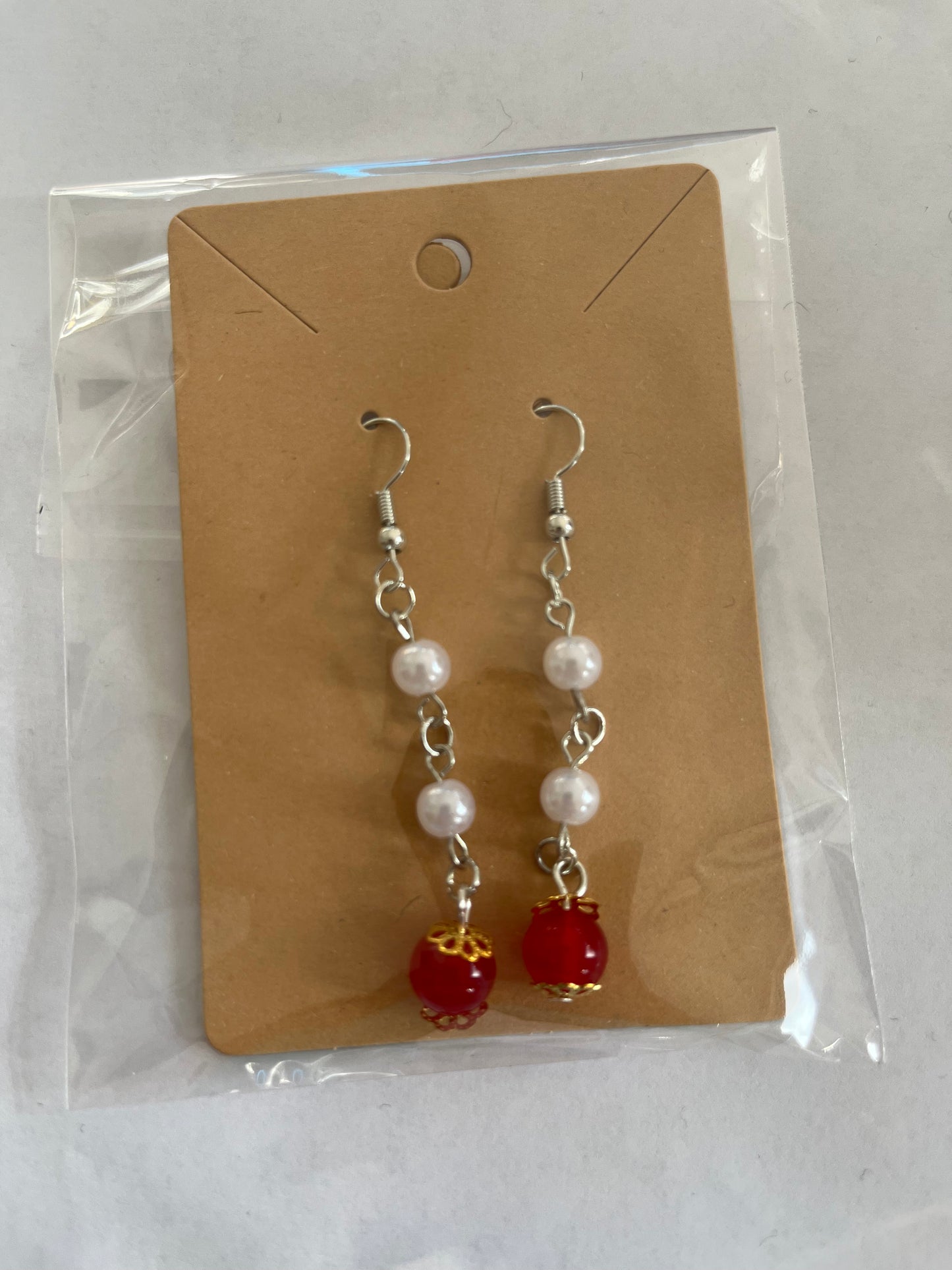 the cherry crown with silver tone earrings